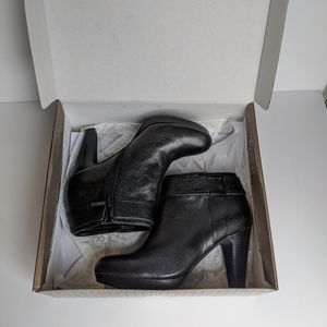 Black leather high heel boots